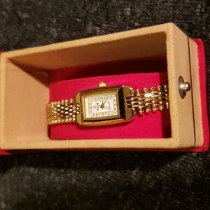 New gold tone watch